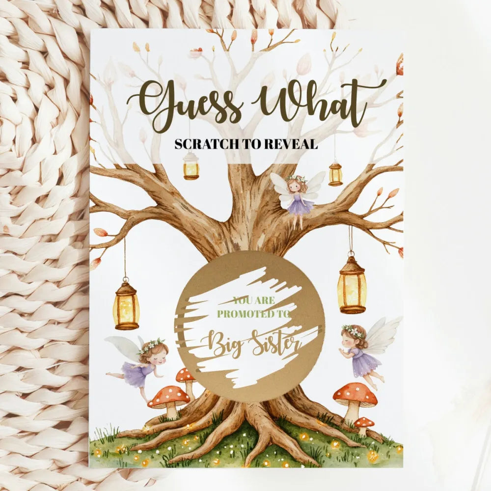 Card with fairy design and text 'Guess What Scratch to Reveal' on a textured surface