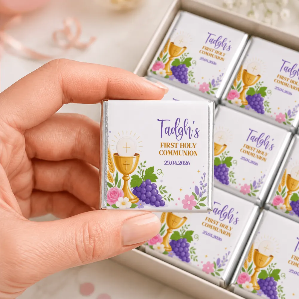 A small silver-wrapped mini neapolitan chocolate bar with gold and purple floral designs and a golden chalice label
