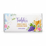 A personalised 40g chocolate bar featuring white chocolate wrapped in foil with a colorful communion design