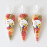 Three clear plastic communion sweet cones filled with colorful gummy candies in three sizes sealed at top