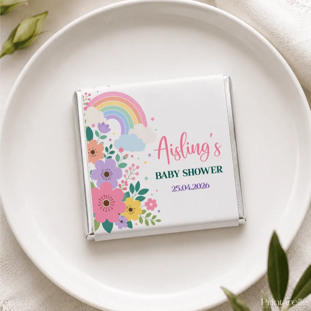 A personalized white chocolate bar wrapped in foil with colorful floral rainbow design for aisling baby shower mini neapolitan chocolates