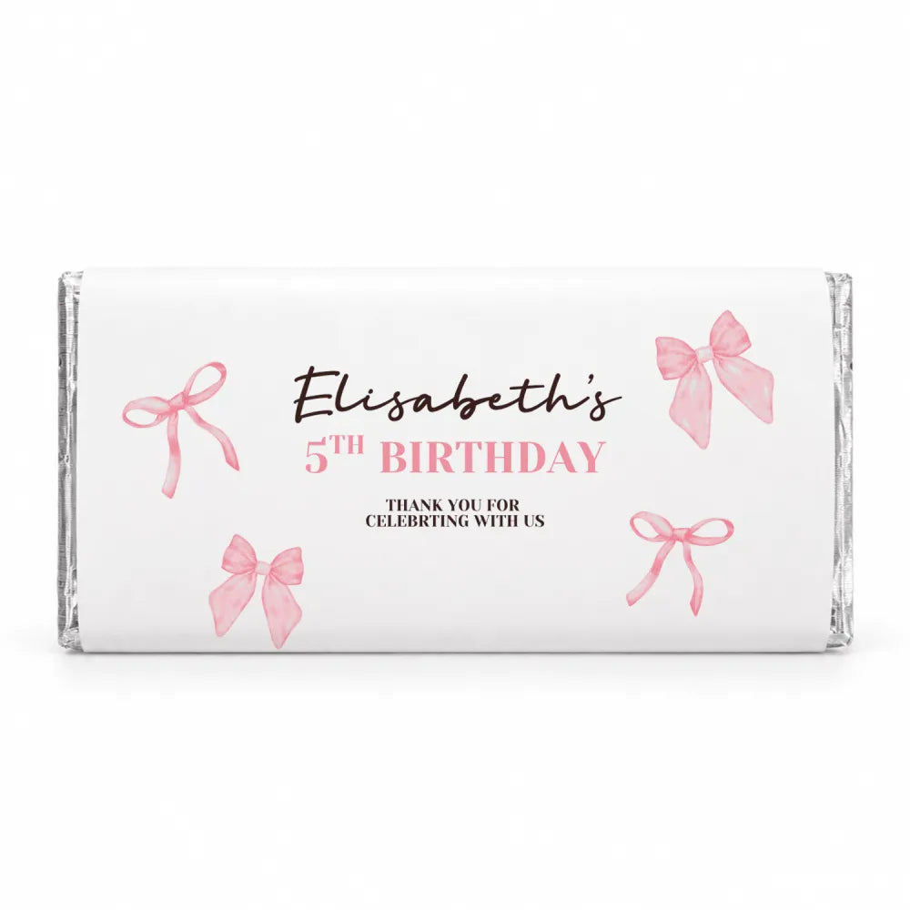 A personalised 40g white chocolate bar with pink bows for elisabeths 5th birthday in ribbons and bows design