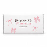 A personalised 40g white chocolate bar with pink bows for elisabeths 5th birthday in ribbons and bows design
