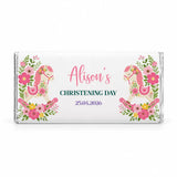 A white chocolate bar wrapper with pink and green floral designs and rocking horse illustrations personalized for alison 40g chocolate bars