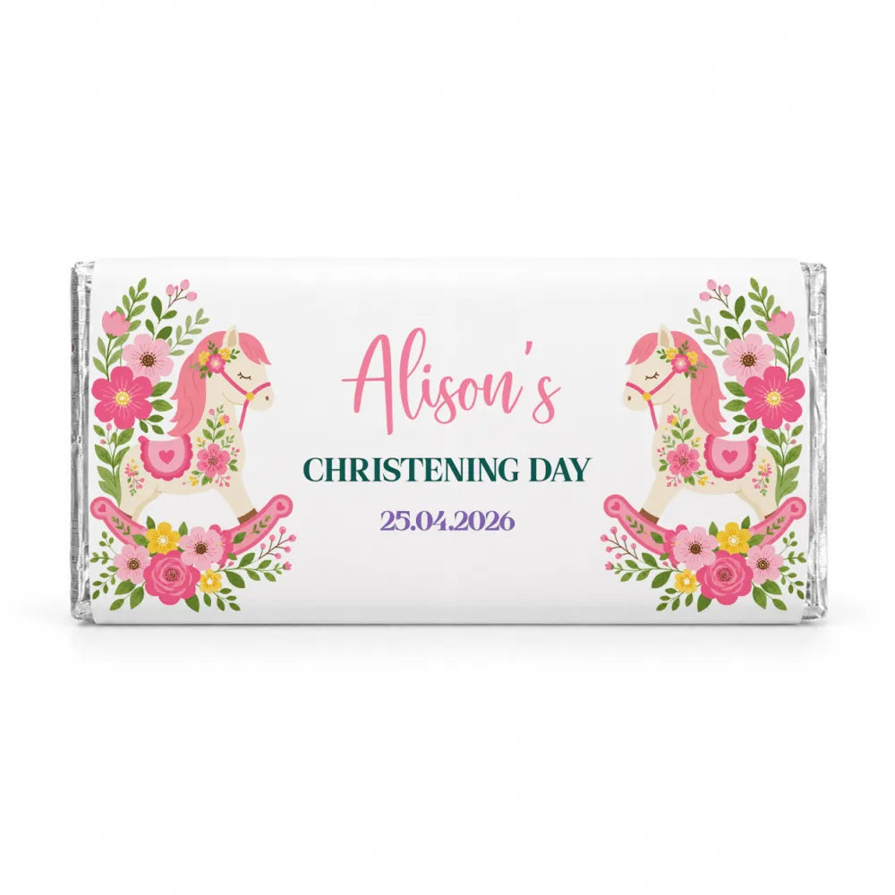 A white chocolate bar wrapper with pink and green floral designs and rocking horse illustrations personalized for alison 40g chocolate bars
