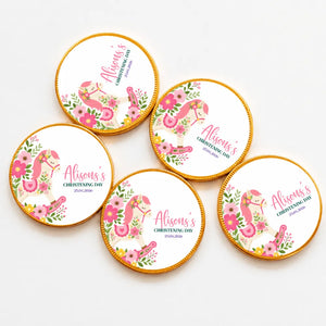 Pink rocking horse christening chocolate coins with floral designs and gold foil edges for personalized gifts
