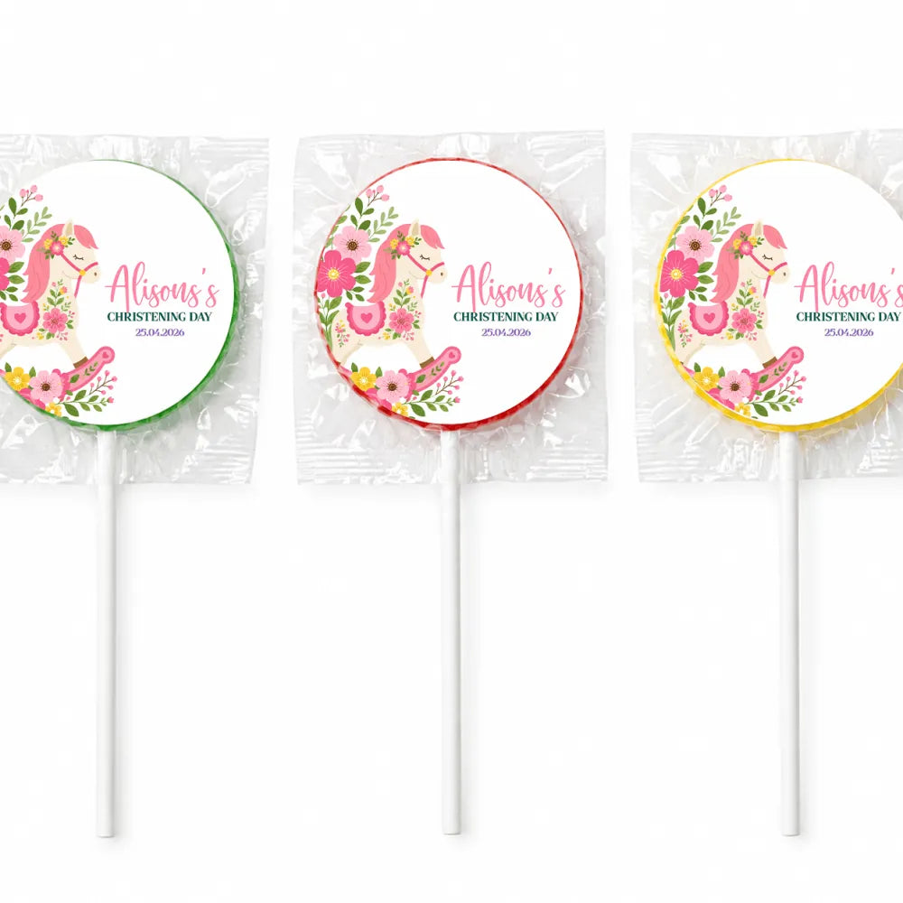 Three personalized pink rocking horse swirl lollipop favours for alisons christening day with floral designs