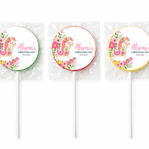 Three personalized pink rocking horse swirl lollipop favours for alisons christening day with floral designs