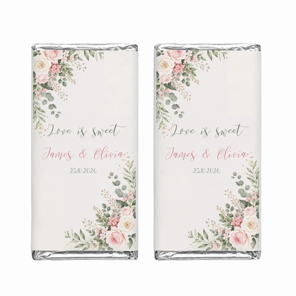 Two personalised 40g chocolate bars with soft pink and green floral design wrapped in clear foil for rose corner wedding