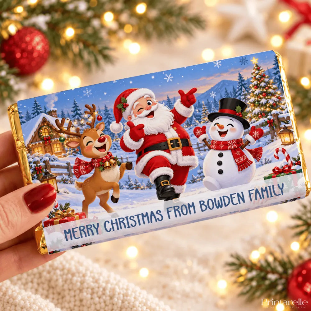 A festive chocolate bar wrap in gold foil with santa, a reindeer, and snowman for family christmas fun