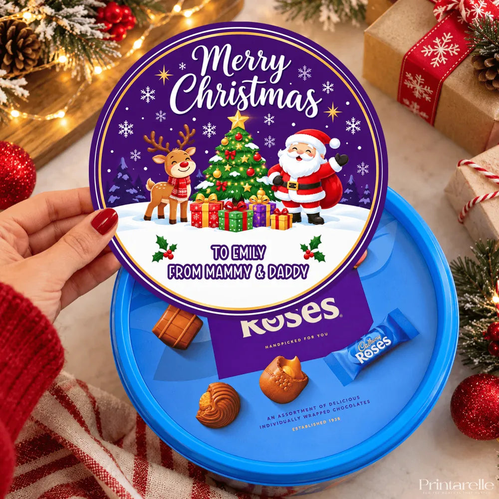 A festive purple and blue reindeer tub sticker with santa waves and a christmas scene for to and from labels