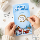 Blue christmas scratch card with santa reindeer sleigh and snowy scene featuring gold scratch sticker by printarelle