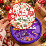 A festive circular chocolate tin with a red white santa lid and merry christmas message perfect for christmas gifts