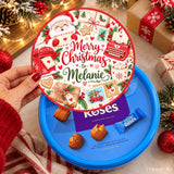 A festive red circular lid for cadbury roses tin with santa claus and snowflakes perfect for merry christmas gifts