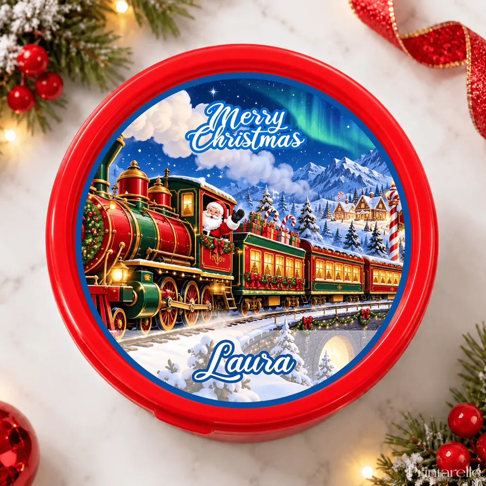 Red circular christmas-themed cookie jar with festive steam train loaded design and personalised tub sticker laura on lid