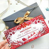 Red christmas holiday reveal card with intricate poinsettias bells ornaments and reindeer sleigh cut-out designs