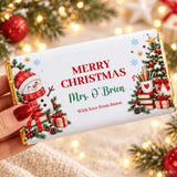 A festive white chocolate bar wrap with cheerful snowman, christmas tree, and personalized teacher christmas chocolate design