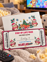 A festive white and pink stay up late pass featuring cartoon owls in santa hats for the 2025 late late toy show