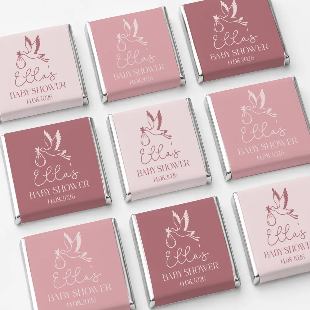 Pink and rose gold foil wrapped stork mini neapolitan chocolates perfect baby shower favours with ellas baby shower text