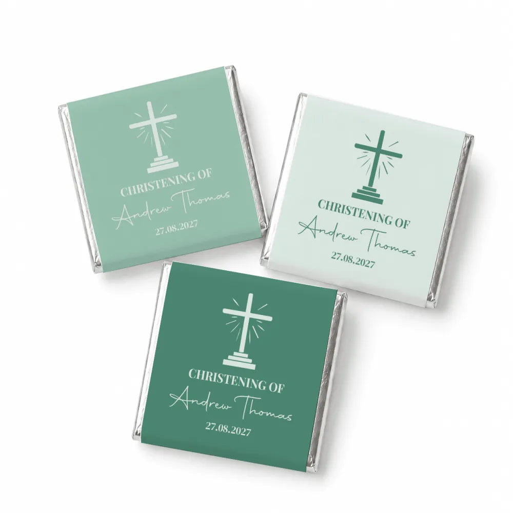 Three mini neapolitan chocolates wrapped with sunburst cross design for andrew thomas christening favors august 27 2023