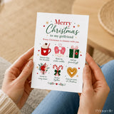 A white girlfriend christmas card with red and green text featuring hot chocolate mittens gift candy canes and heart ornament