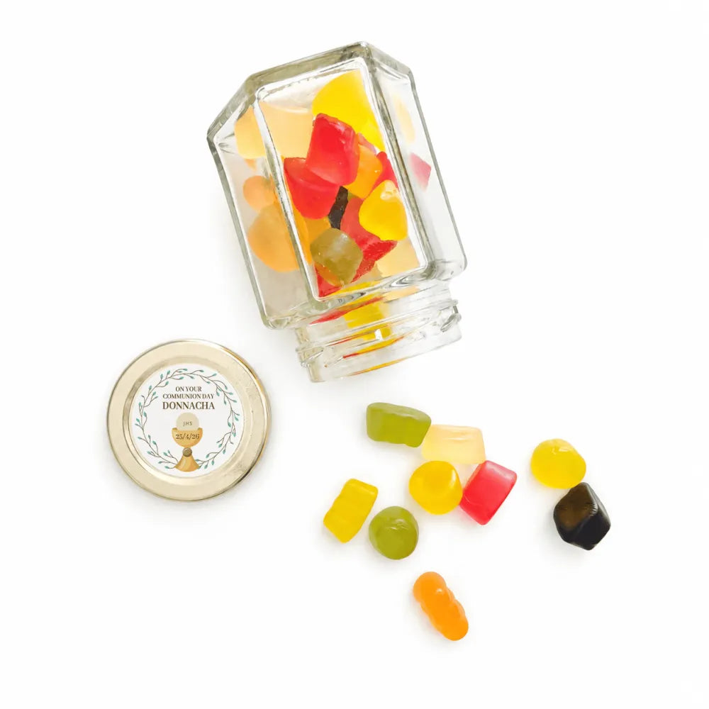 Clear glass sweets in hex jar with pale gold twist lid and colourful gummies personalized sticker option