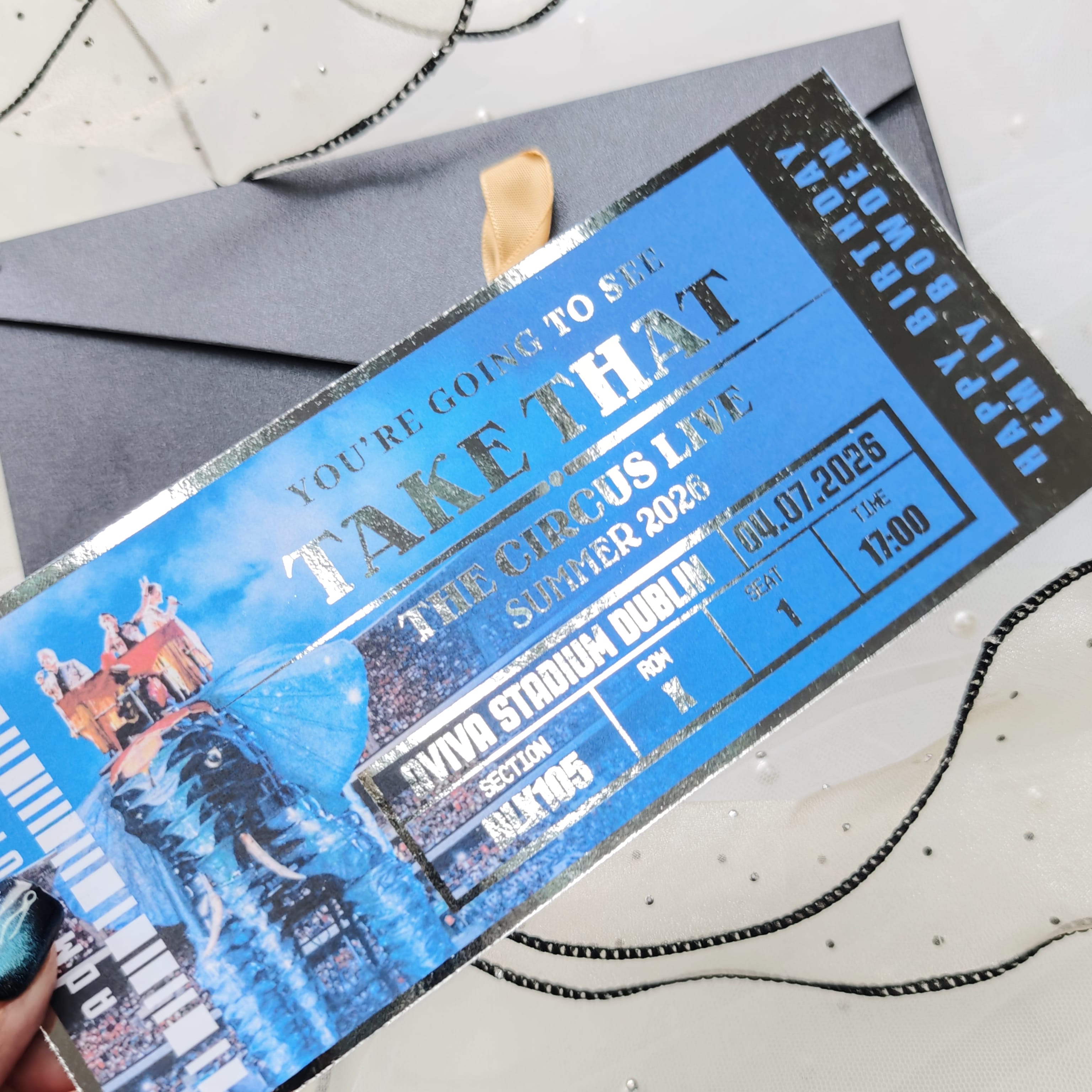 Promotional ticket for 'Take That' concert at The Circus Live in Dublin on July 14, 2026.