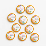 Cute circular chocolate coins with a yellow border featuring a pink teddy bear and personalised christening text