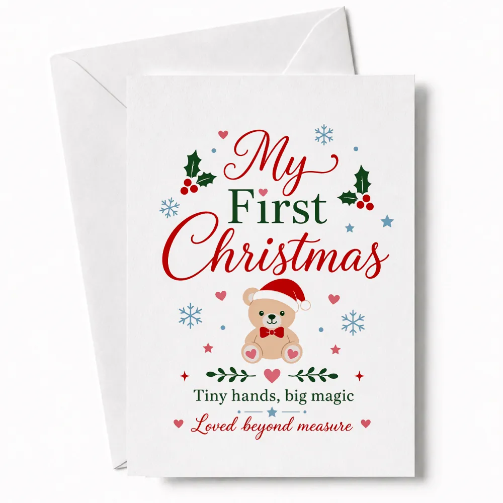 White christmas card with beige teddy bear in red santa hat and bow tie surrounded by festive tiny hands big magic graphics