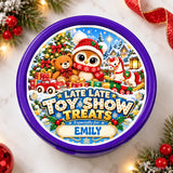 Purple circular tin with festive christmas tub sticker featuring owl teddy bear horse winter toy train and candy cane design