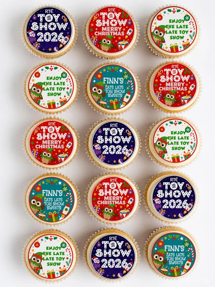 Decorated cupcakes with festive rte toy show 2026 and finn’s late late toy sweets icing sheet toppers in red green blue