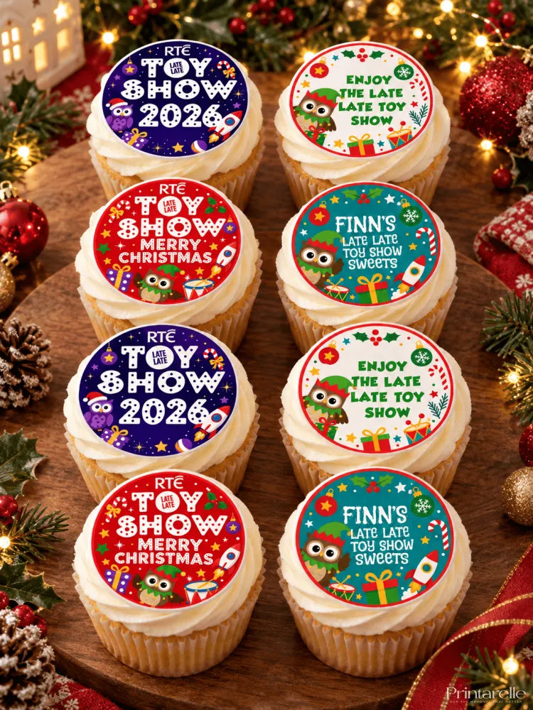 Cupcakes with colorful red blue green icing sheet toppers for late late toy show sweets on wafer paper