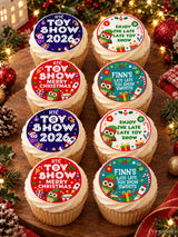 Cupcakes with colorful red blue green icing sheet toppers for late late toy show sweets on wafer paper