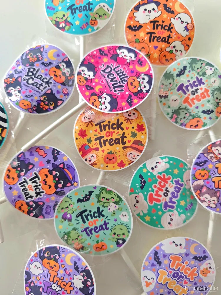Colorful trick or treat personalised halloween lollipops with assorted fruit flavors and black cat cartoon designs