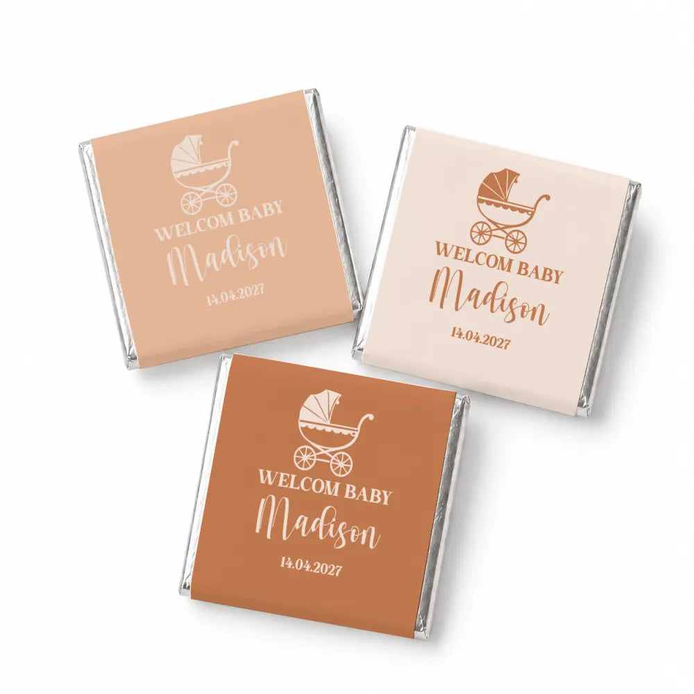 Personalized vintage pram mini neapolitan chocolates wrapped in metallic foil with peach and blush pink labels for baby showers