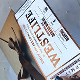 Ticket-style gift box with 'Westley' branding and a brown ribbon.