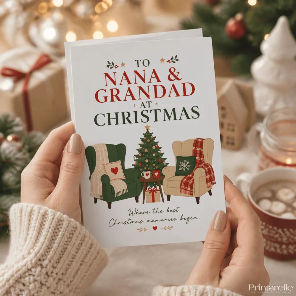 A white christmas card featuring a decorated tree and two armchairs with blankets for nana and grandad christmas card