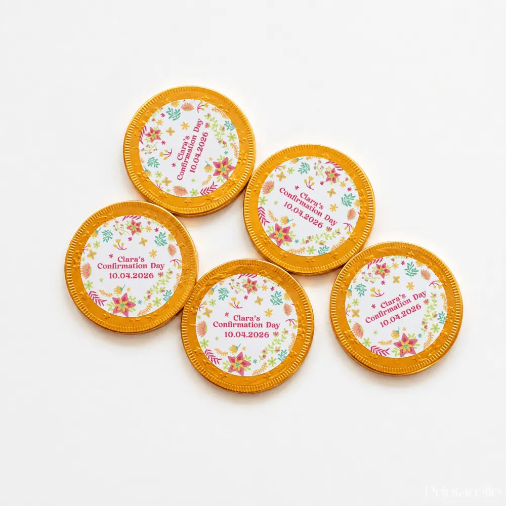 Golden 40mm milk chocolate coins with white floral center and pink text clara’s confirmation day 10.04.2026
