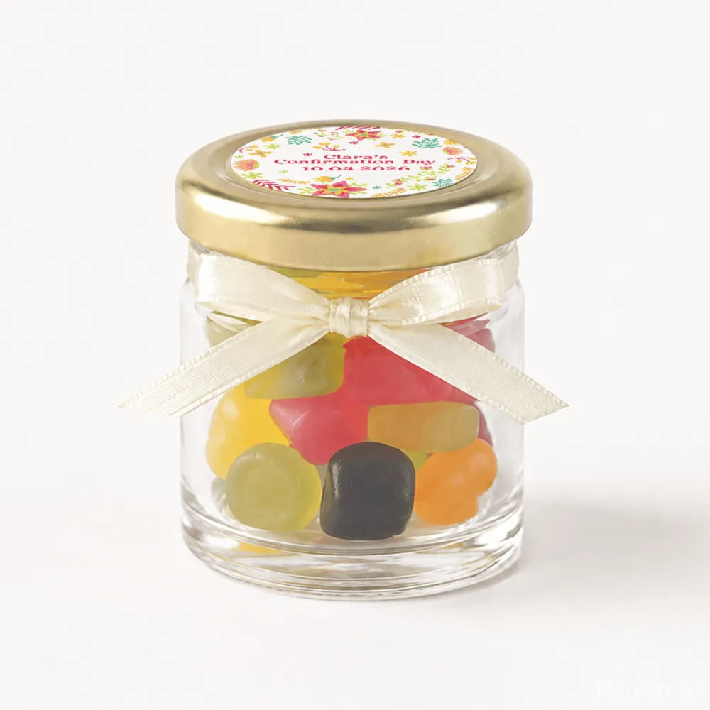 Wildflower blessing personalised mini jar favour with 43mm pale gold lid and cream ribbon filled with colorful gummy candies