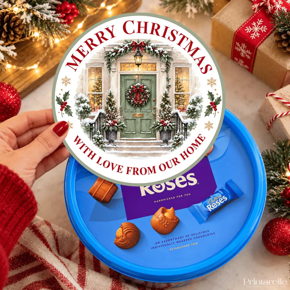 A festive blue cadbury roses tub with a ready printed merry christmas door tub sticker design and holiday decor